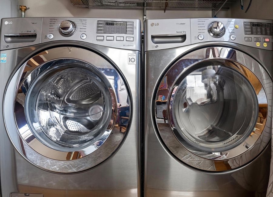Front load washer/ dryer off second floor office space.