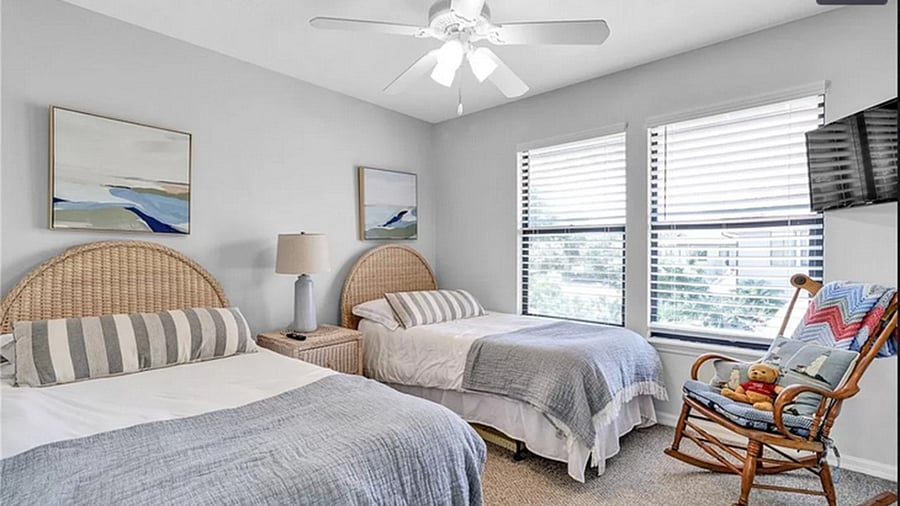 Second bedroom. Two twin beds, Wall mounted TV