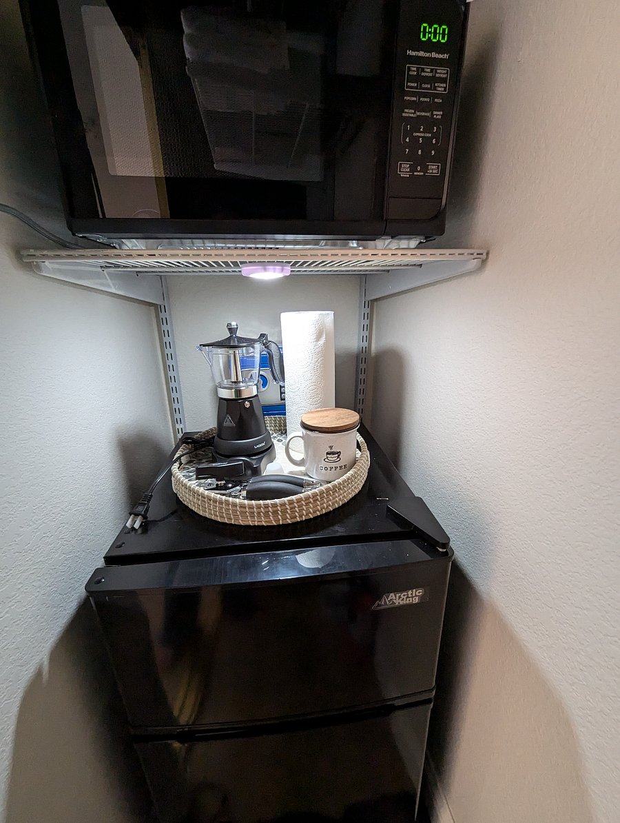 Microwave and fridge for convenience.