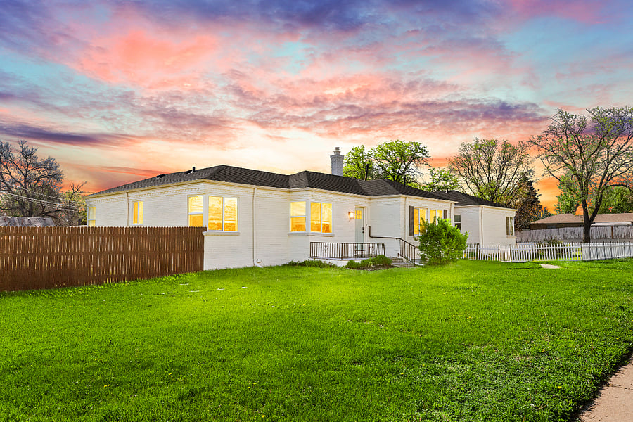 Ample front yard and fully fenced back yard.
