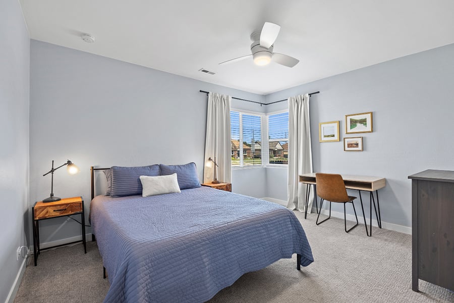 Second light-filled bedroom. Also great for guests or a separate workspace. Blackout curtains on all windows.