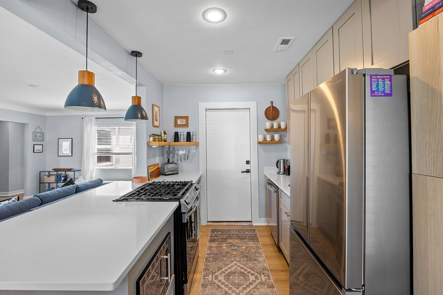 Modern kitchen with full-size appliances and tons of storage.