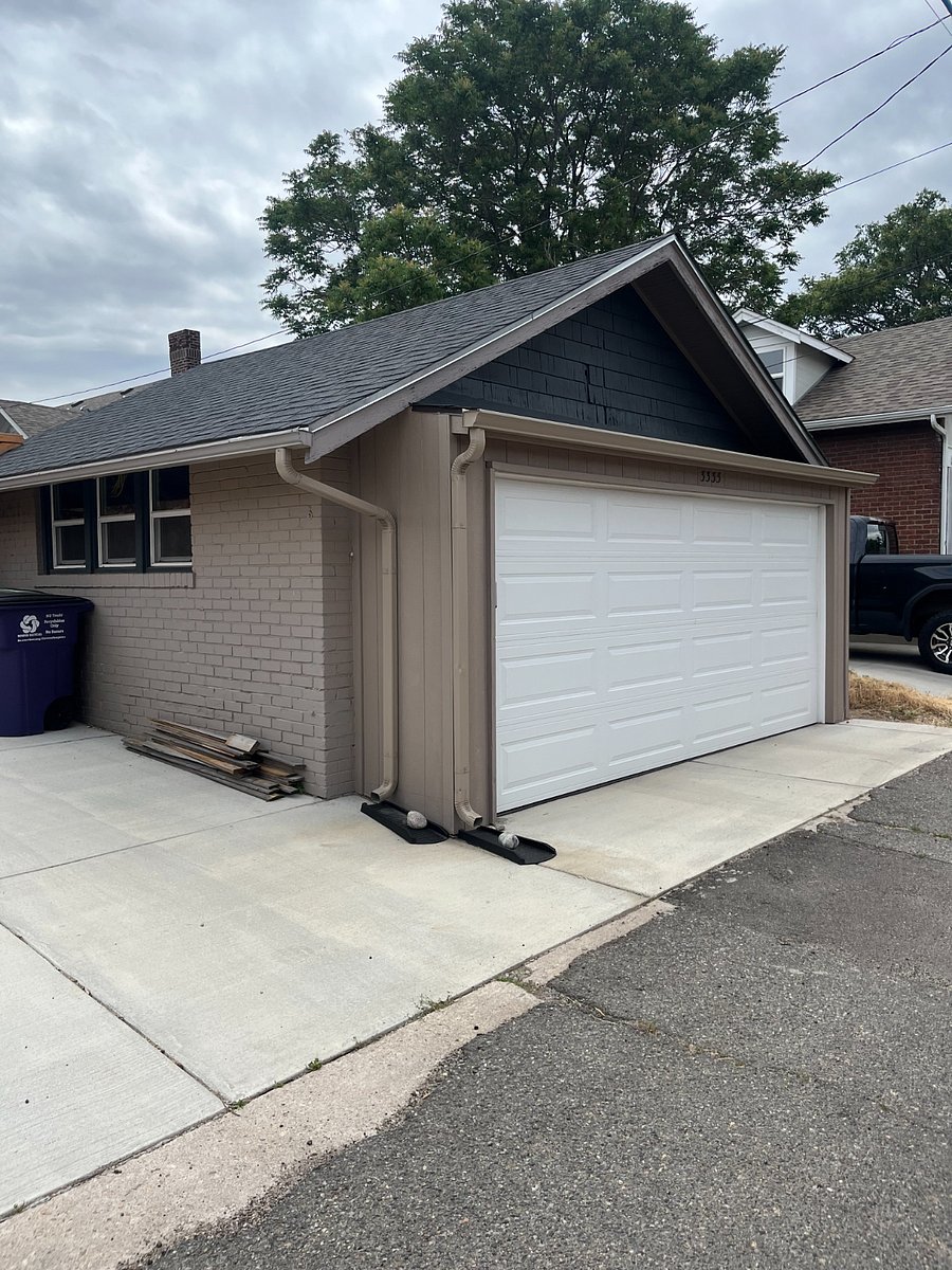 1 car detached garage with concrete slab for an additional uncovered spot