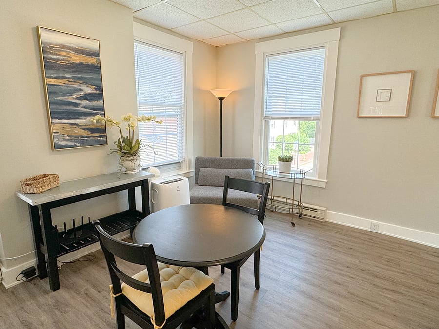 Inviting and filled with natural light, the airy kitchenette boasts extra-large windows, perfect for sitting and reading or enjoying a cup of tea or coffee.