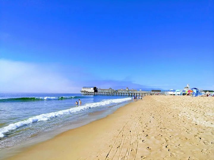 Pier is about a mile on the sand or the sidewalks