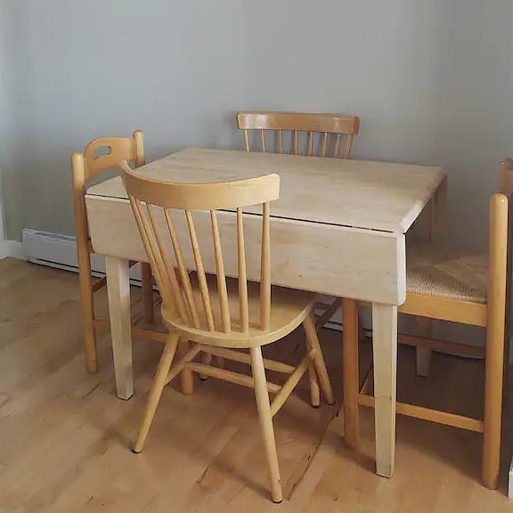 Table folds up for seating for four, plus bar/counter with seating for two 