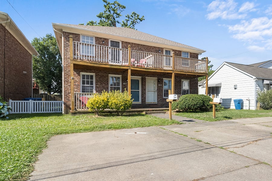 brick side by side condo w. so much to offer