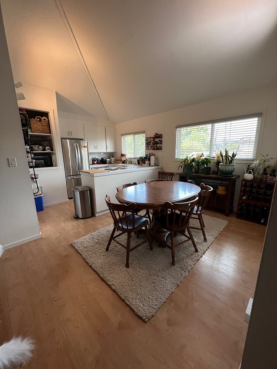 Large table in common area for working eating and hosting.