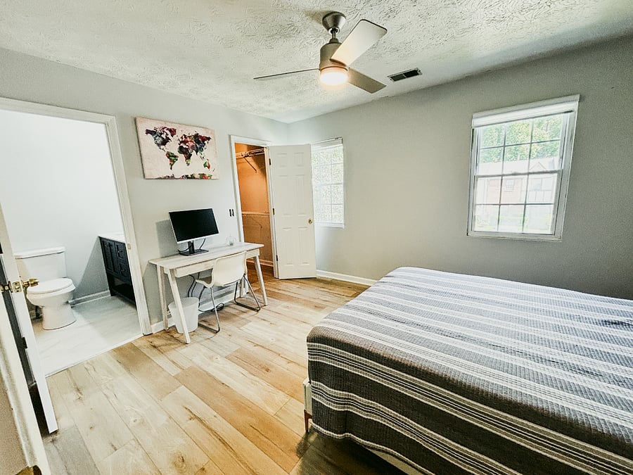 Upstairs Queen Bedroom #1: Desk, closet, and ensuite bathroom