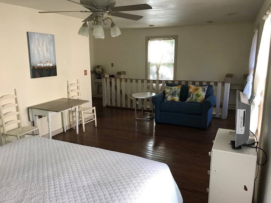 Rear view of bedroom facing stairwell