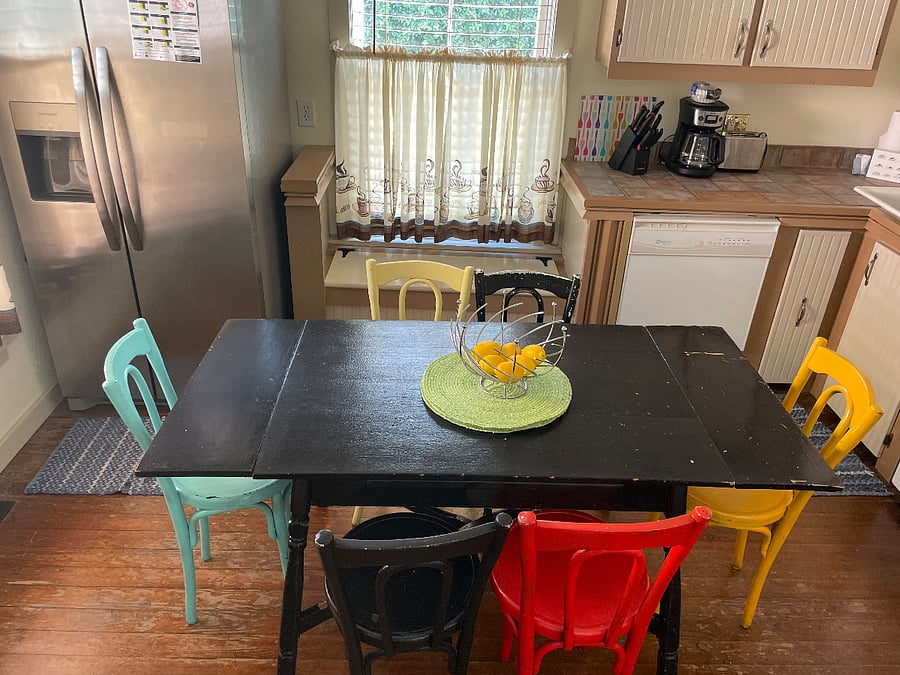 Antique table seats 6 plus bench storage/seat beneath window
