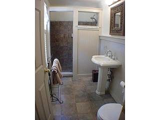 first floor full bath. Senior friendly. Walk-in shower with handrail and hand-held showerhead.