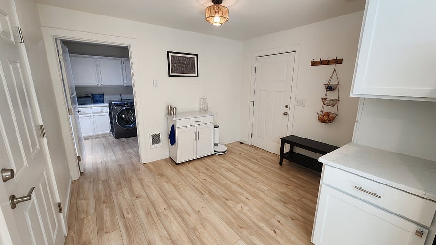 Entry from garage & mini-bar