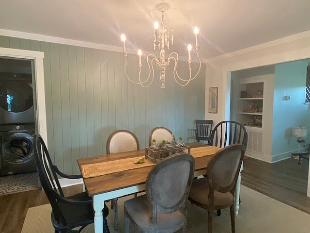 The eat in area of the kitchen, farm table seats six with additional seating (3) at the kitchen island