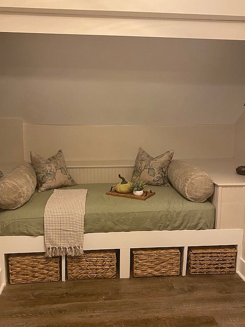 Reading nook is located upstairs between the two bedrooms.