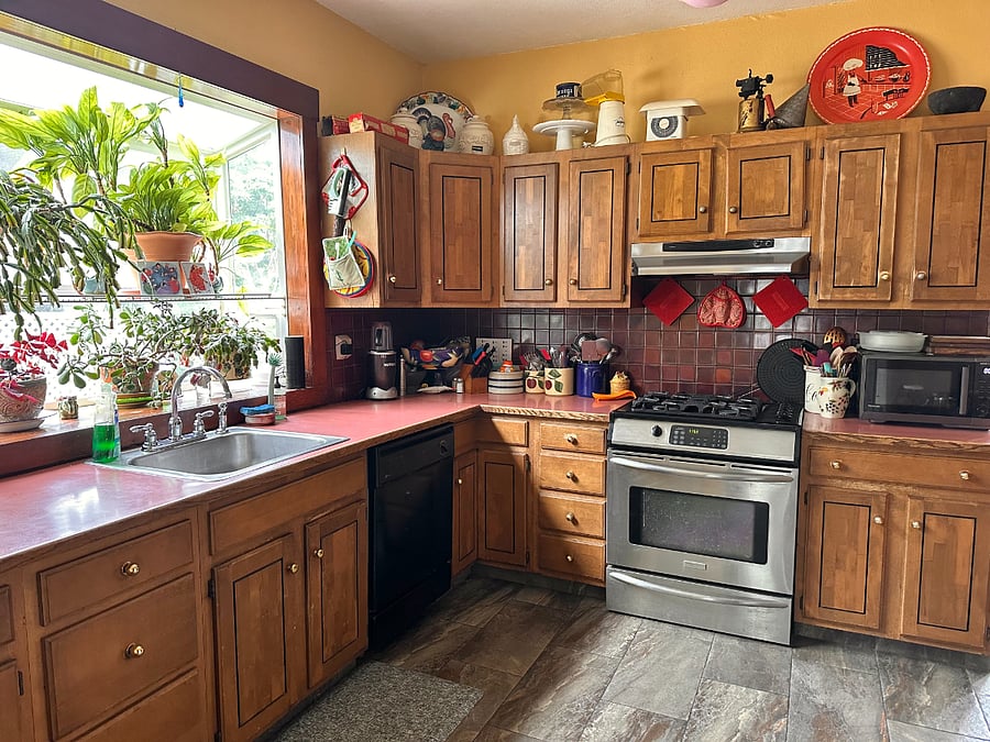 Main floor kitchen with garden window.