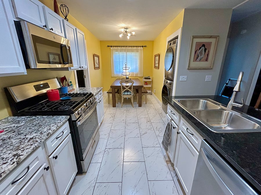 Full kitchen amenities and gas stovetop - ready for you to cook all your meals.