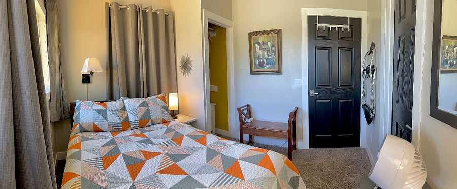Front bedroom, brand new, premium mattress on full size bed with upgraded pillows and linens. Black out curtains.