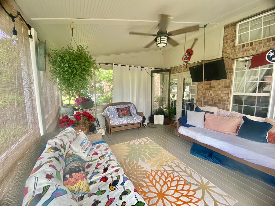 Screened-In porch with twin bed swing, TV and water fountain