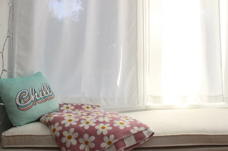 Cozy up in this window seat nook.