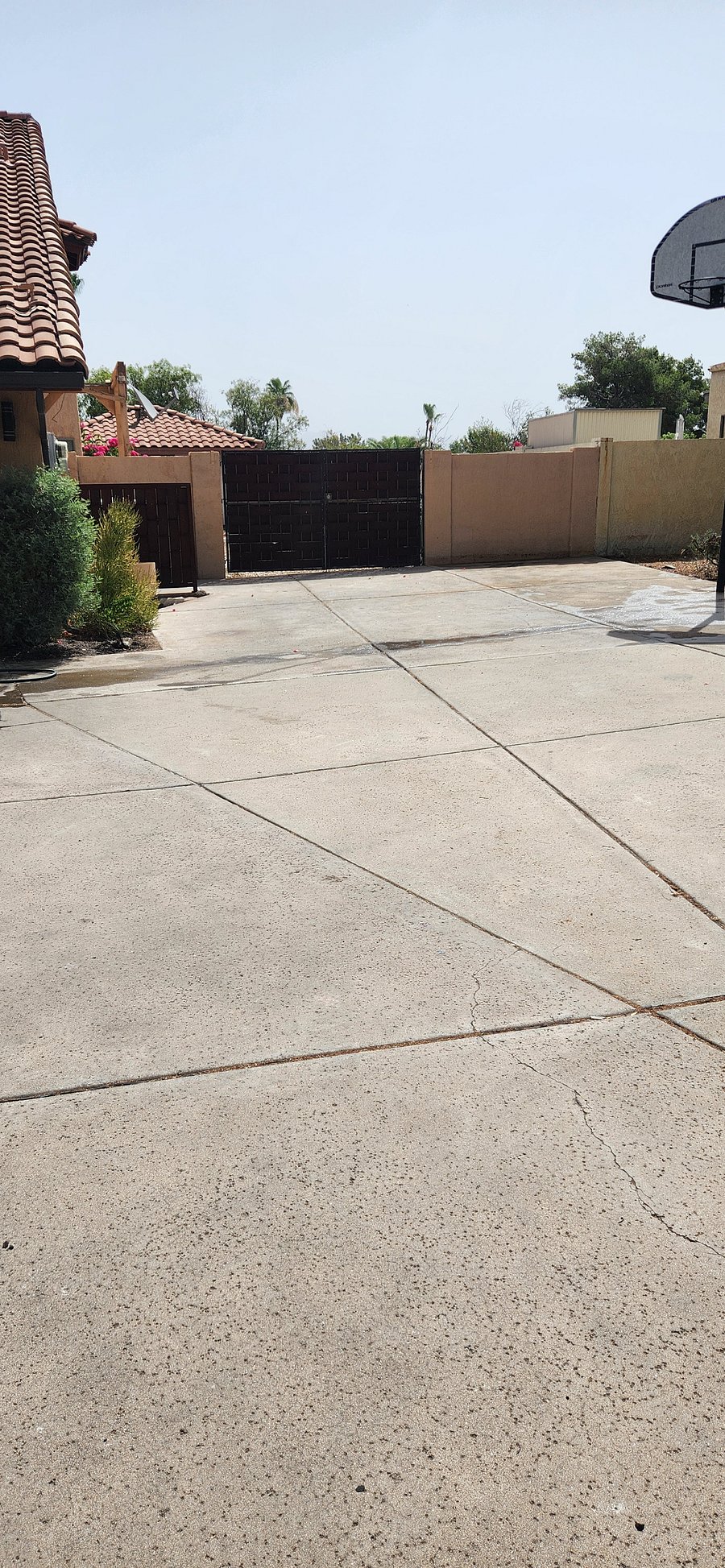One parking space by basketball hoop