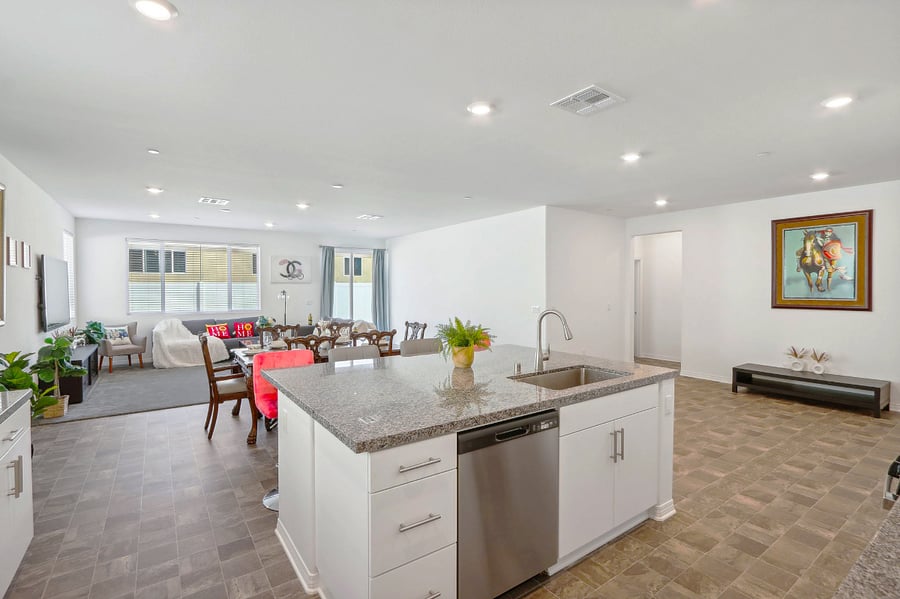 Stylish kitchen island with high chairs, perfect for casual meals and lively conversations!