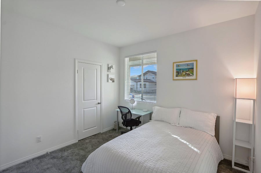 Drift off in this charming bedroom, complete with fresh linen.