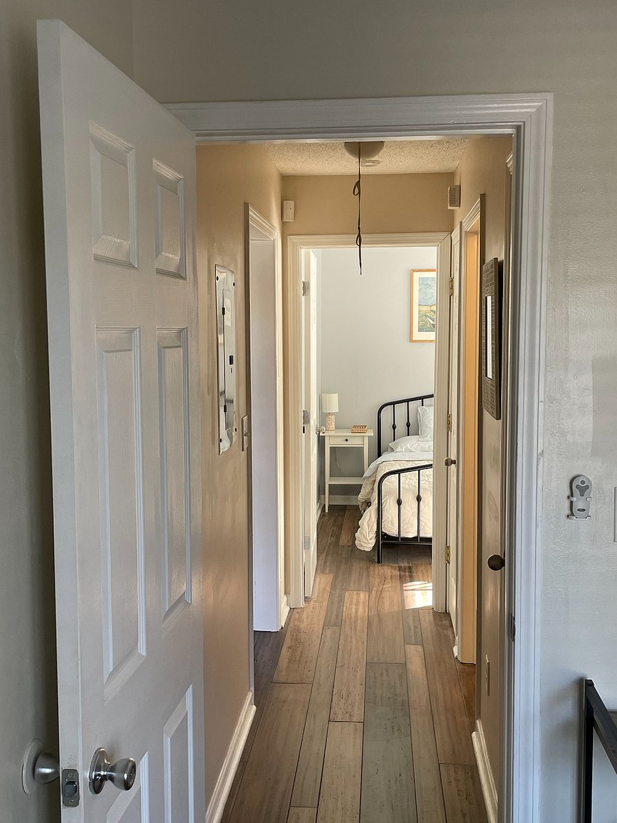 Hall way between the two bedrooms on the opposite side of the house, away from the Master