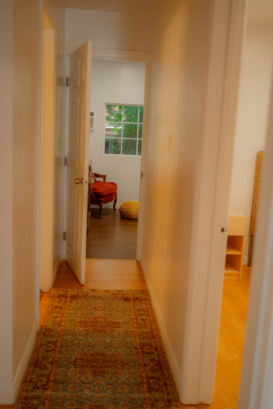 hallway to first bedroom and rest room