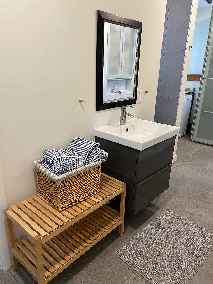 Bathroom / Laundry area with separate toilet room, large shower and washer/dryer