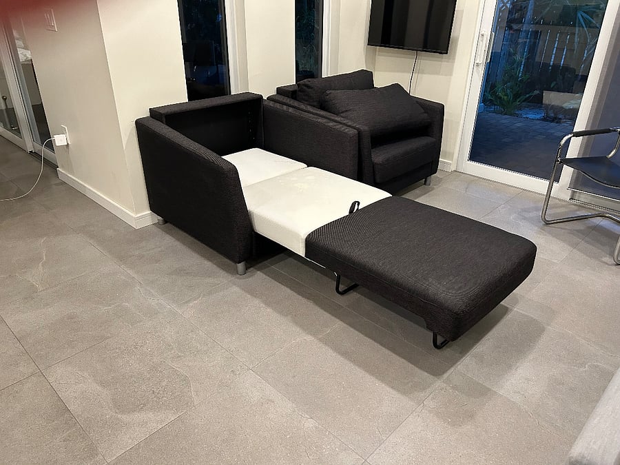 Designer Chairs convert to single beds with memory foam mattresses that are actually comfortable.