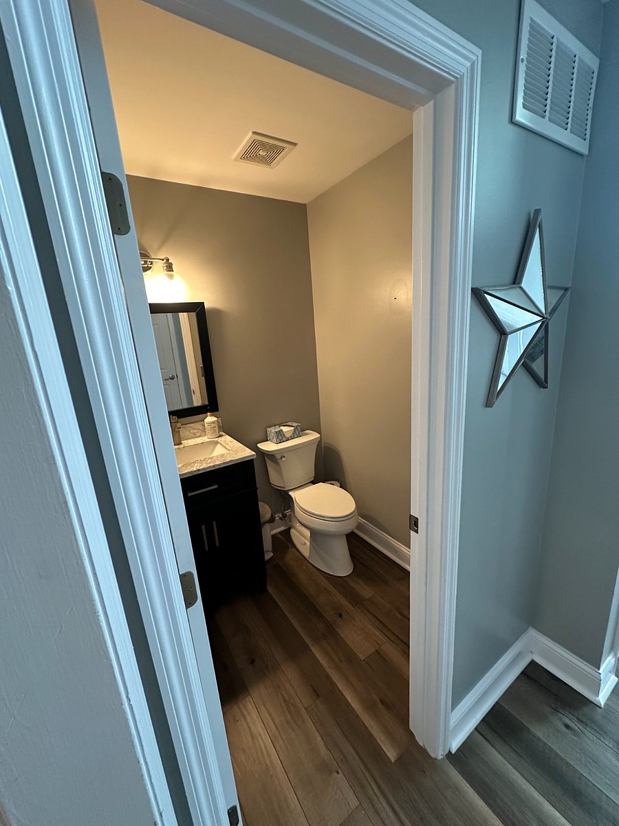 Half bath located in main entry, off the kitchen