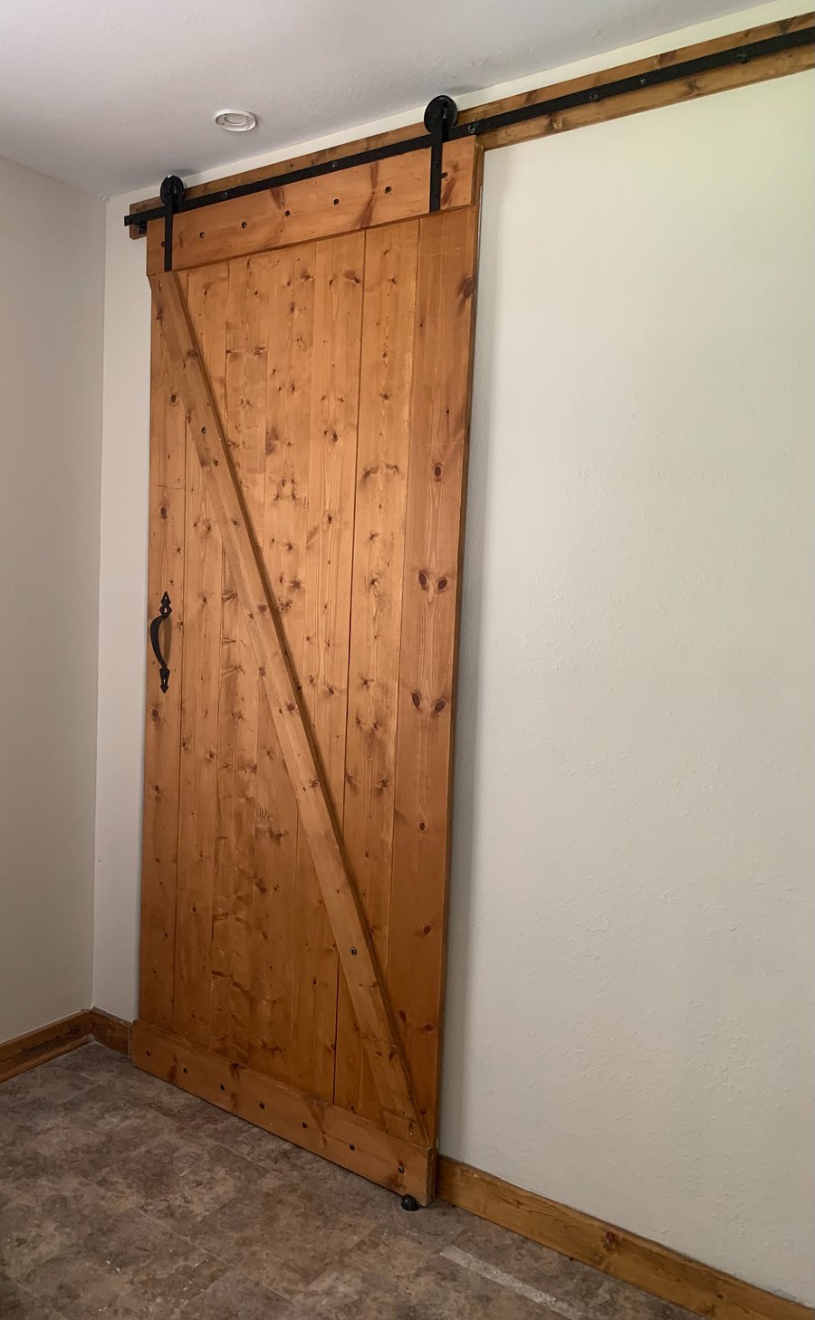 Barn door to bedroom. 