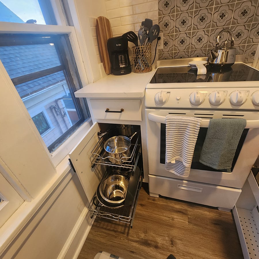 Full size stove with pots and pans
