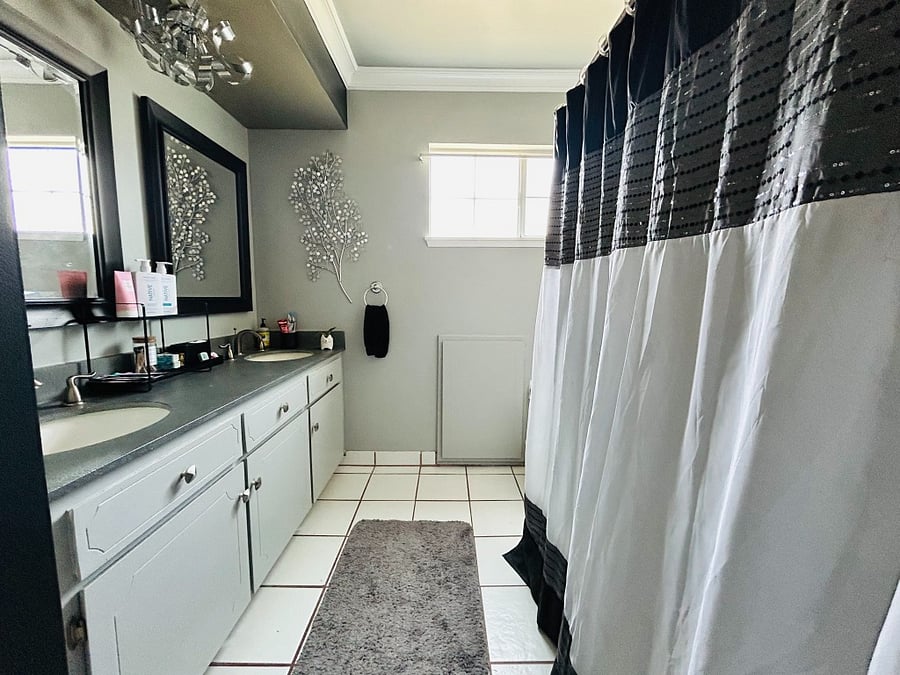 Private bathroom, adjacent to bedroom.