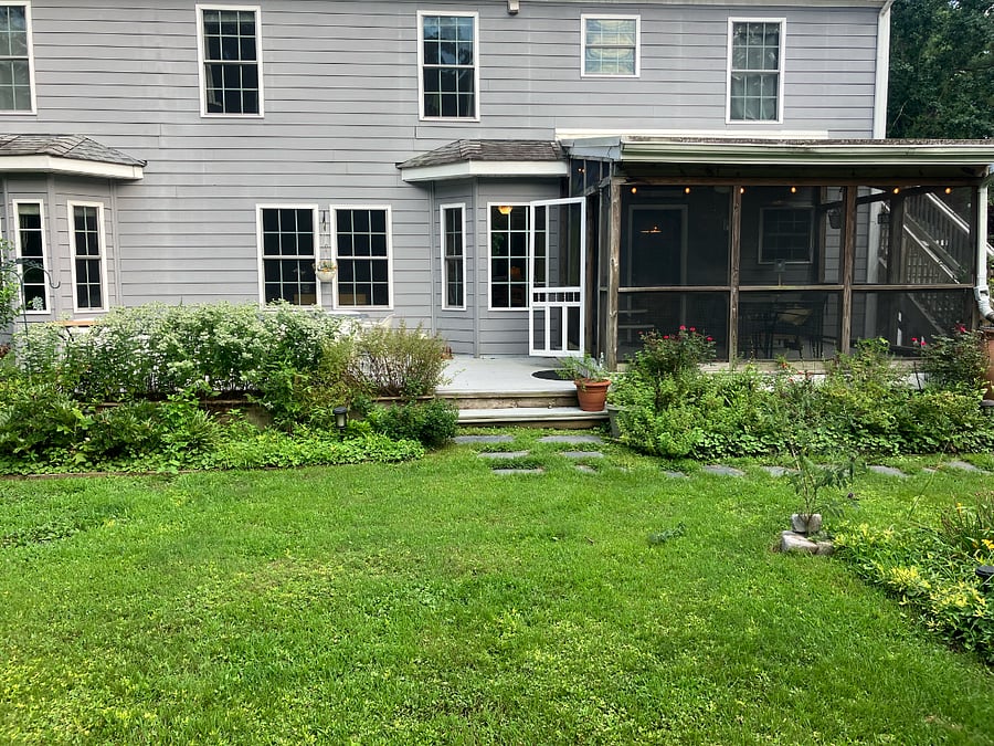 yard view of porch and deck