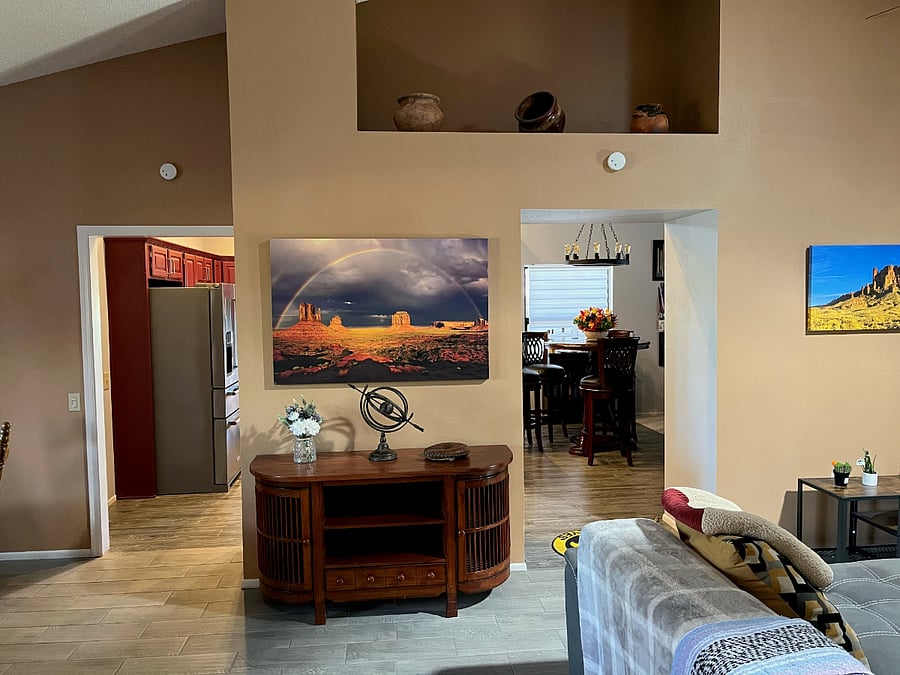 Front room leading to south wing (kitchen, 2nd dining, laundry, garage and family room)