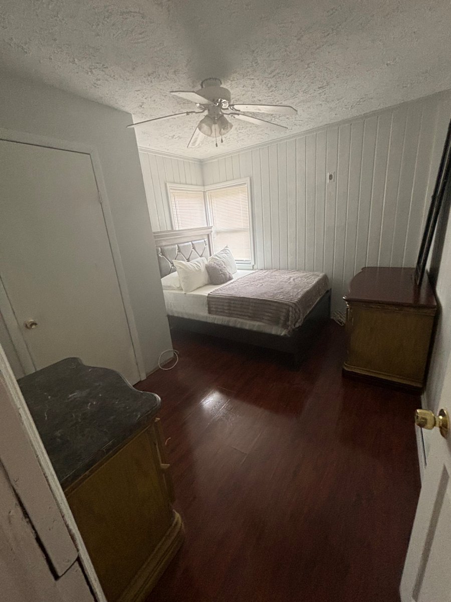 Full size bed with closet and dresser draw(s) and mirror ****BedRoom #1****