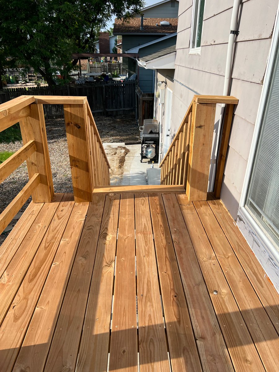 Deck leading down to bbq