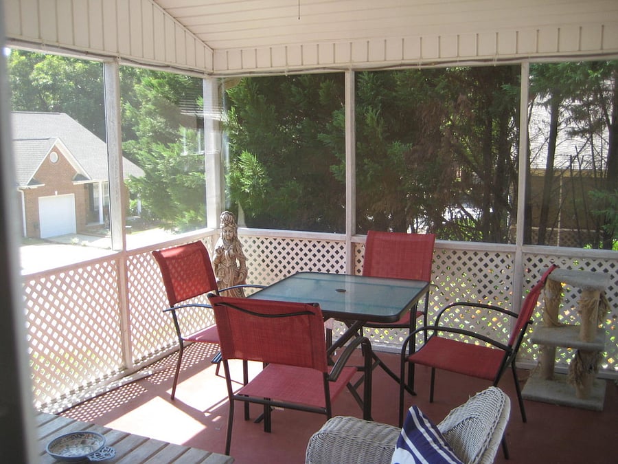 Screened in patio area off the kitchen