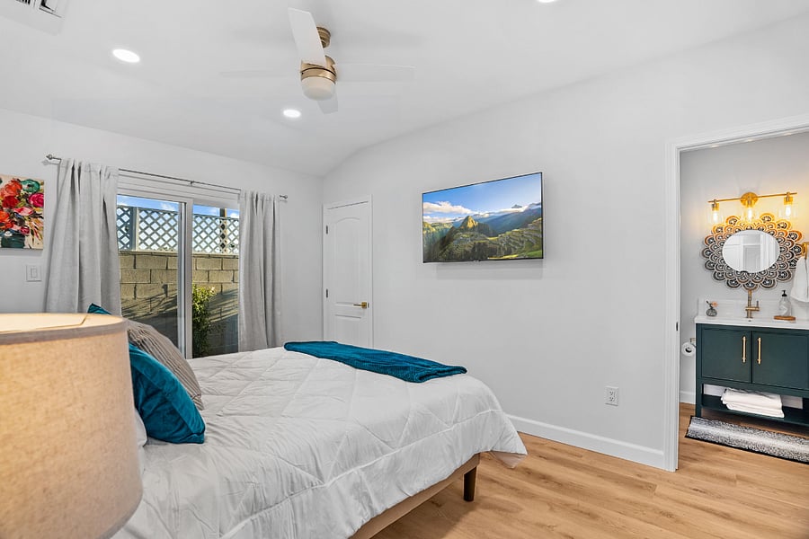 Wall mounted tv in bedroom 