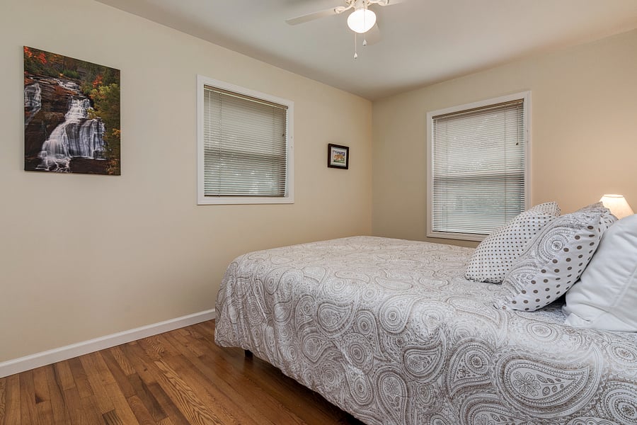 Bedroom #2 offers Queen Sleep Number bed, side tables and closet