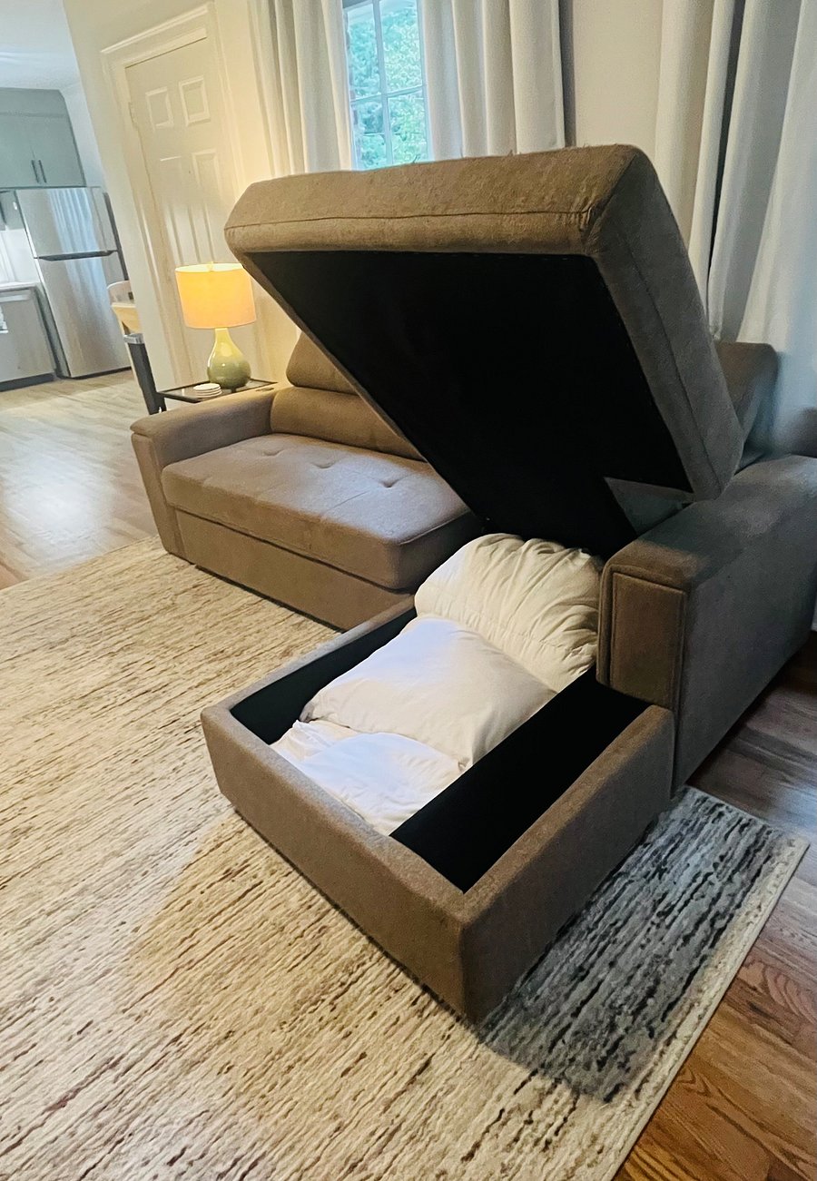 Guest linens, comforter and pillow provided and stored under the chaise
