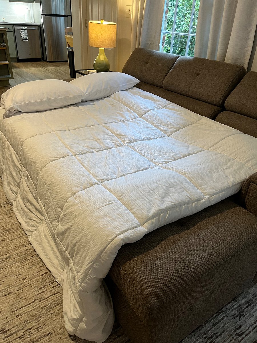 Pop up sofa easily becomes a full size bed for the occasional guest.