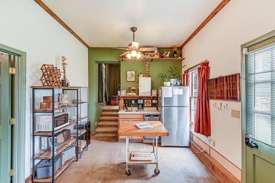 Kitchenette - stairs lead to bathroom.