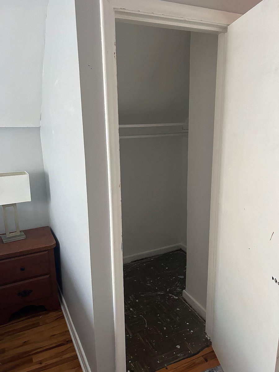 Nice spacious closet with a shelf