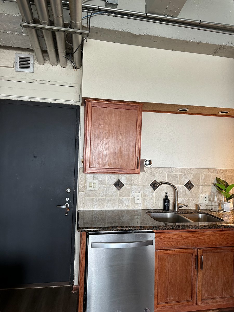 Front entry door and kitchen.