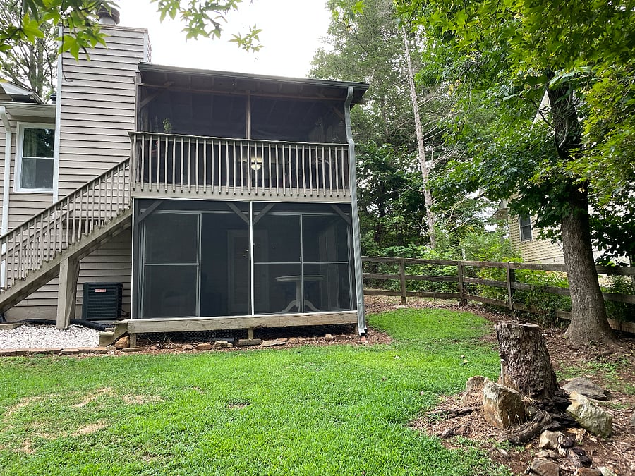 Private ground level screened in sun porch. Provides a second entrance through fenced in backyard.