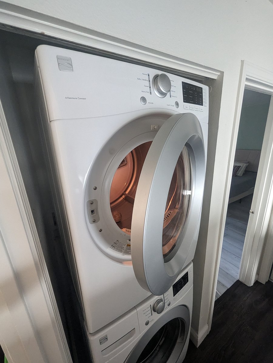 In-unit washer/dryer located just outside the available room