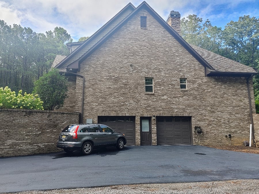 Parking and entry into apartment on lower level.